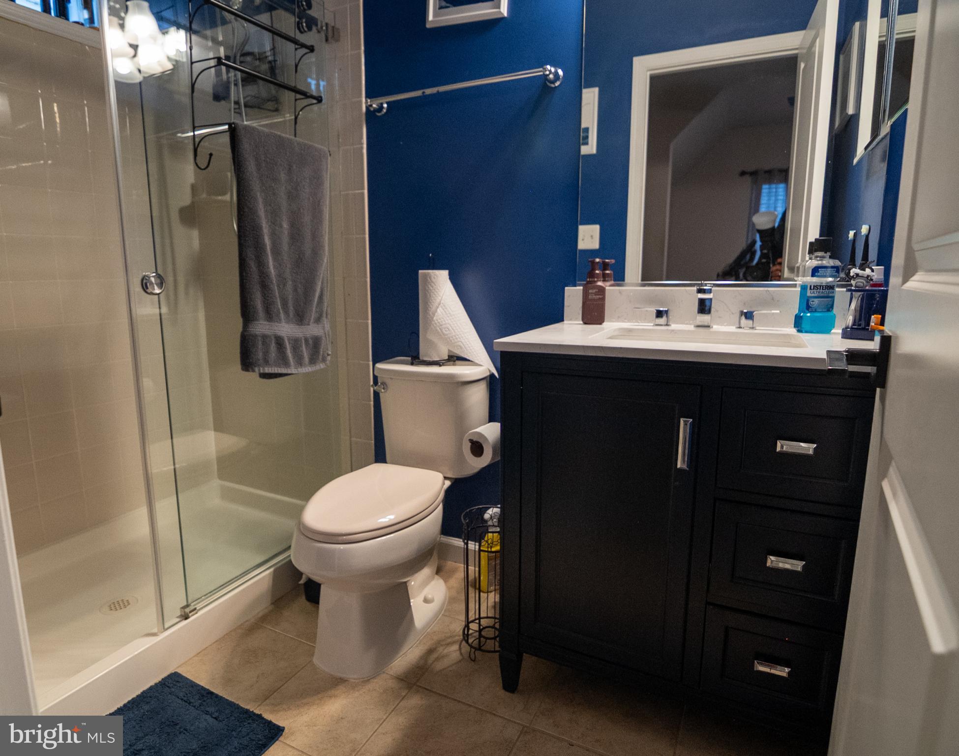 11013 Jumping Way Upper Marlboro, MD 20772 - Photo 29 of 51 a bathroom with a sink toilet and shower