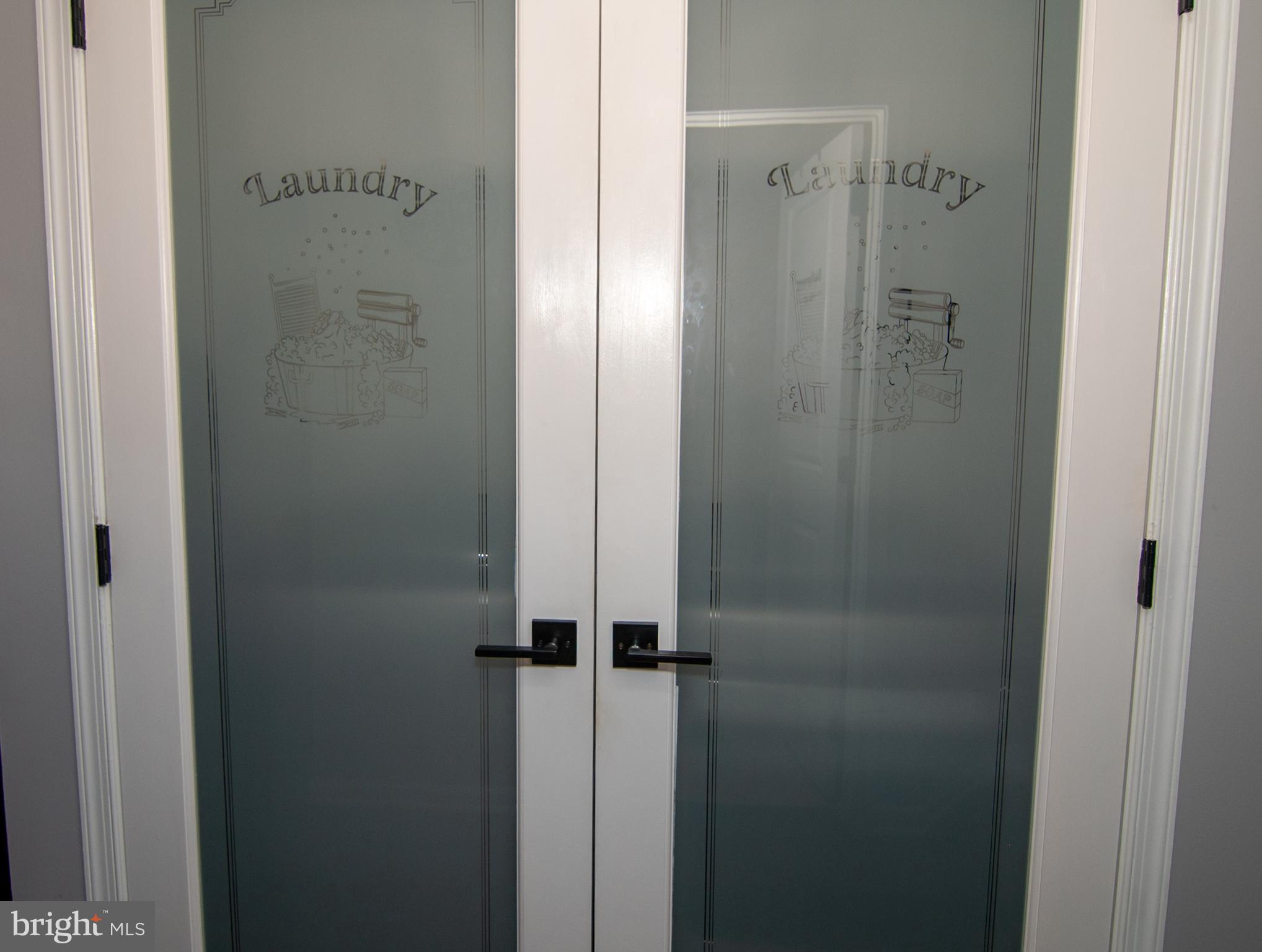 11013 Jumping Way Upper Marlboro, MD 20772 - Photo 32 of 51 a bathroom with a glass shower door