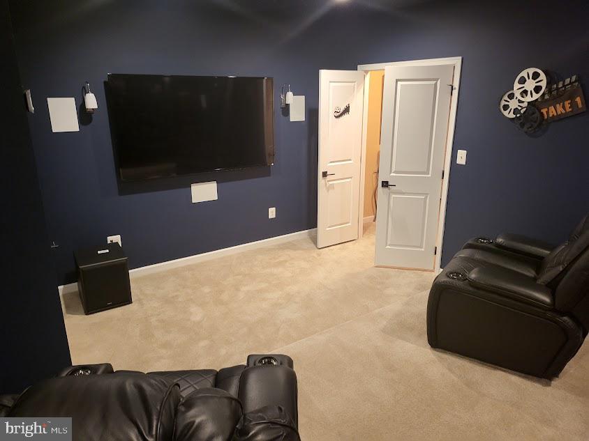 11013 Jumping Way Upper Marlboro, MD 20772 - Photo 46 of 51 a living room with furniture and a flat screen tv