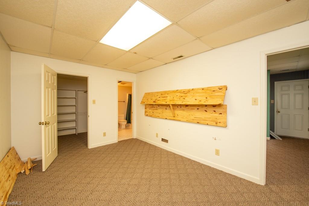 5417 Tower Road Greensboro, NC 27410 - Photo 33 of 42 Office in basement with large storage closet