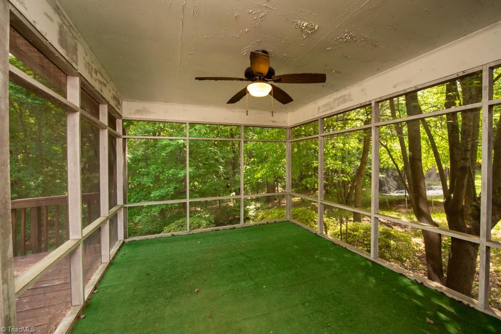 5417 Tower Road Greensboro, NC 27410 - Photo 36 of 42 Screened porch off of kitchen