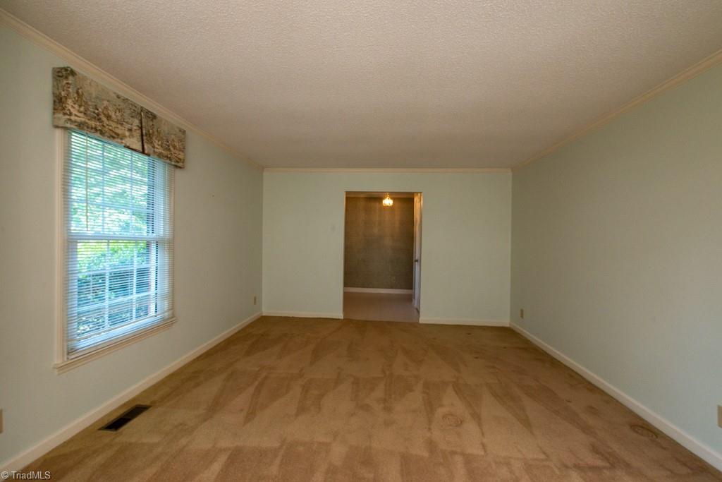 5417 Tower Road Greensboro, NC 27410 - Photo 8 of 42 Living room look into entry