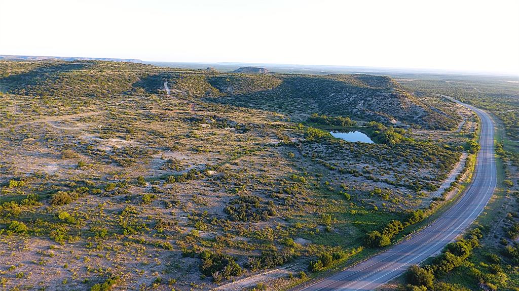 T3 Hwy 208 Robert Lee Tx 76945 Robert Lee, TX 76945 - Photo 3 of 15 a view of a yard with an ocean