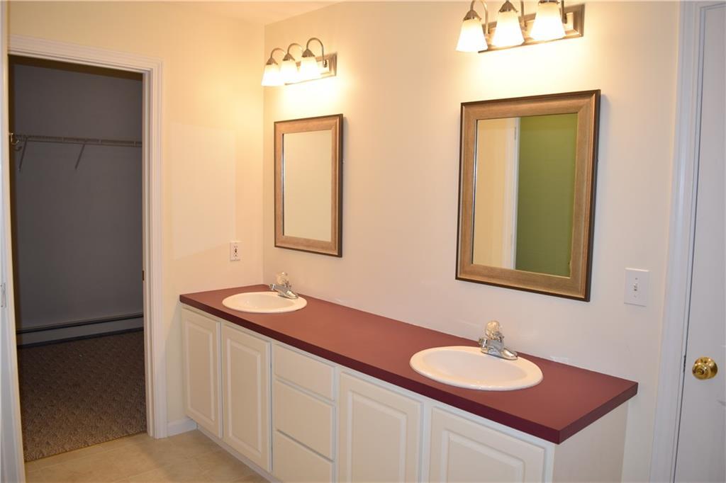 110 Granite Ridge Road New Gloucester, ME 04260 - Photo 16 of 35 View of double vanity and large...