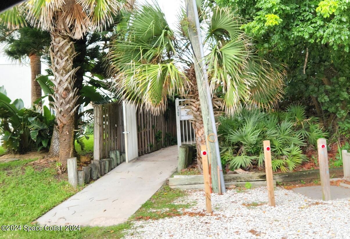 7308 Stuart Avenue Melbourne Beach, FL 32951 - Photo 16 of 16 a view of a backyard
