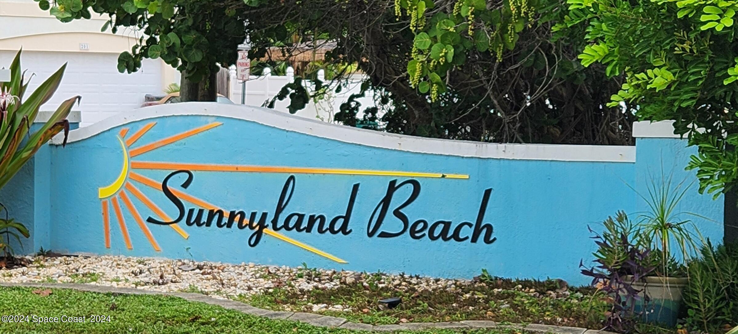 7308 Stuart Avenue Melbourne Beach, FL 32951 - Photo 10 of 16 a view of outdoor space with sign board