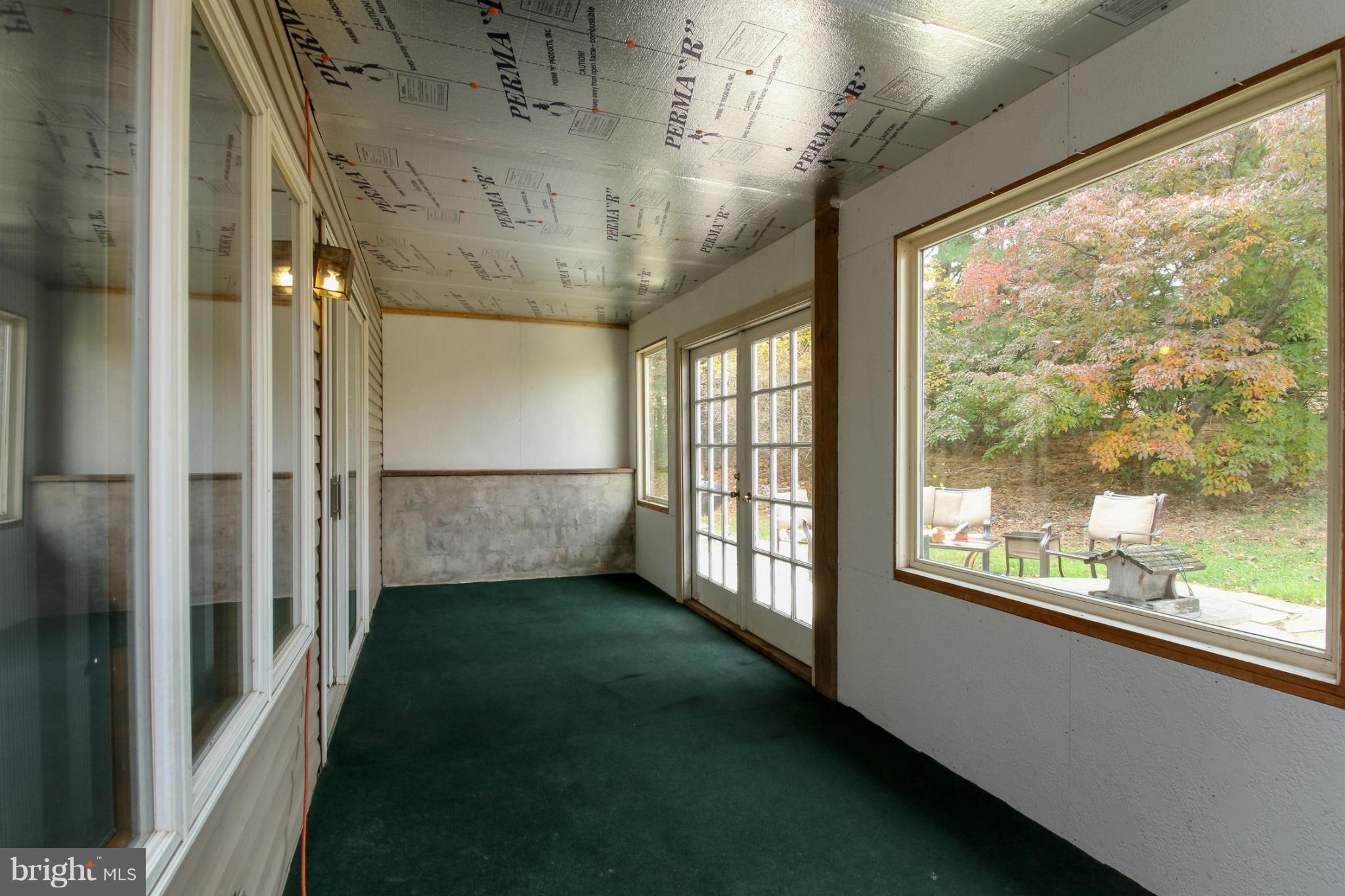 511 East Quaker Bottom Road Sparks, MD 21152 - Photo 23 of 30 a view of a hallway with a window