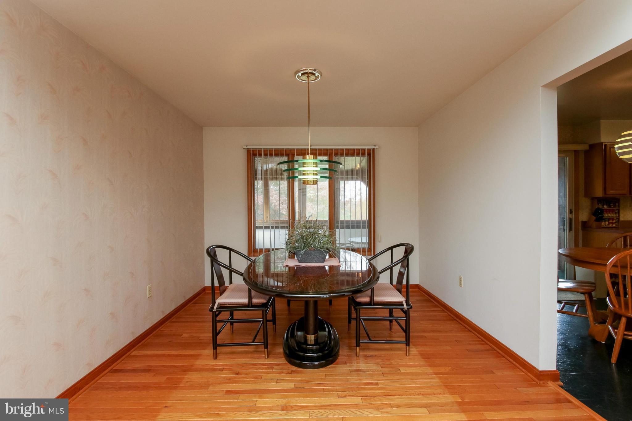 511 East Quaker Bottom Road Sparks, MD 21152 - Photo 9 of 30 a dining room with furniture window and wooden floor