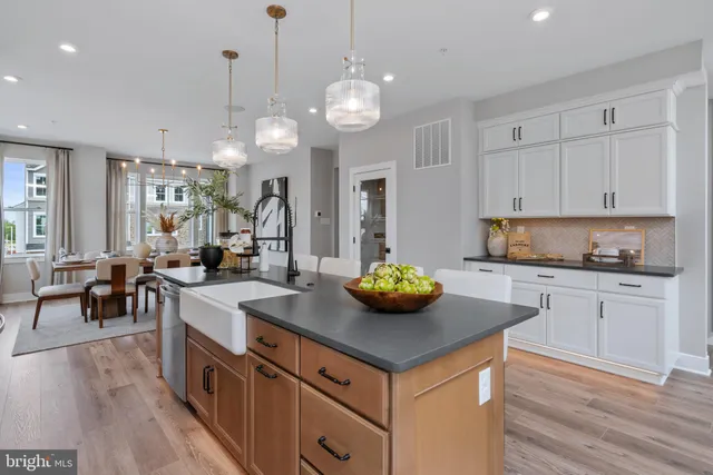 a kitchen with a counter space cabinets and stainless steel appliances