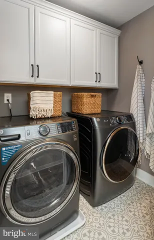 a bed room with a bed and a painting