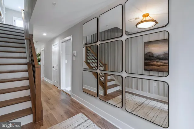 a view of staircase with a rug