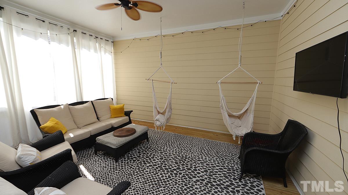 5526 Beardall Street Raleigh, NC 27616 - Photo 24 of 34 Great size Screen Porch just off the Kitchen.