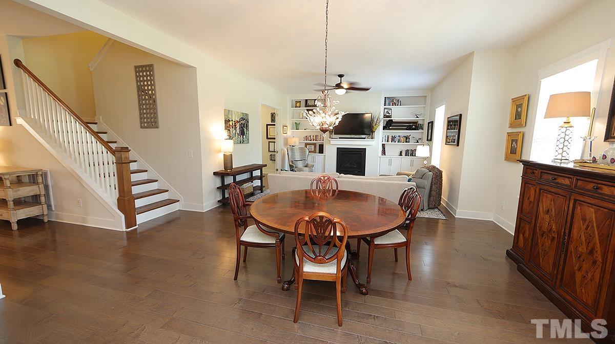5526 Beardall Street Raleigh, NC 27616 - Photo 34 of 34 Wonderful open floorplan with gorgeous wood floors and upgraded lighting throughout the home.