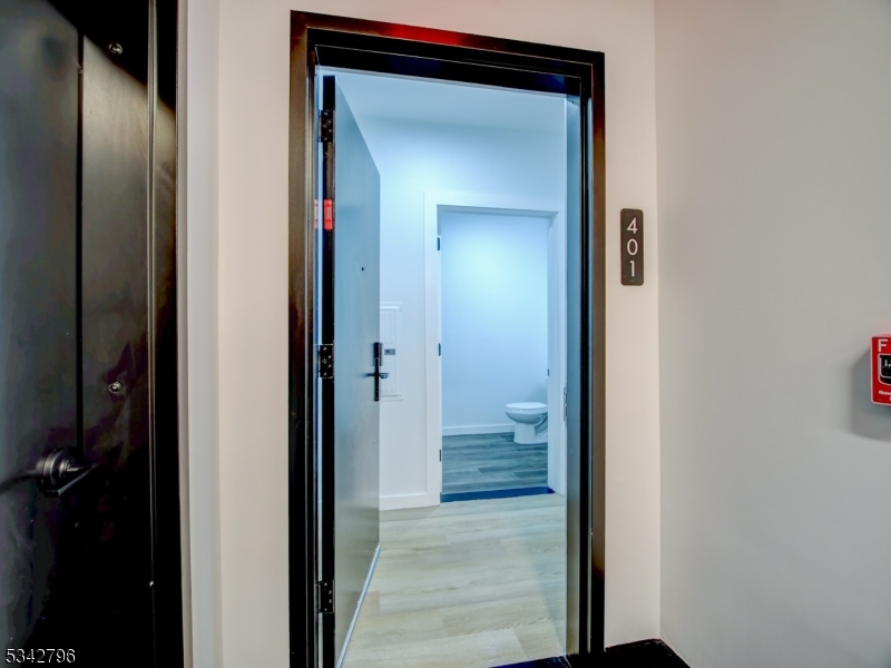 486 Market Street Newark, NJ 07105 - Photo 15 of 34 a view of a bathroom from a hallway