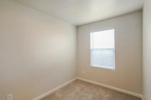 an empty room with a window