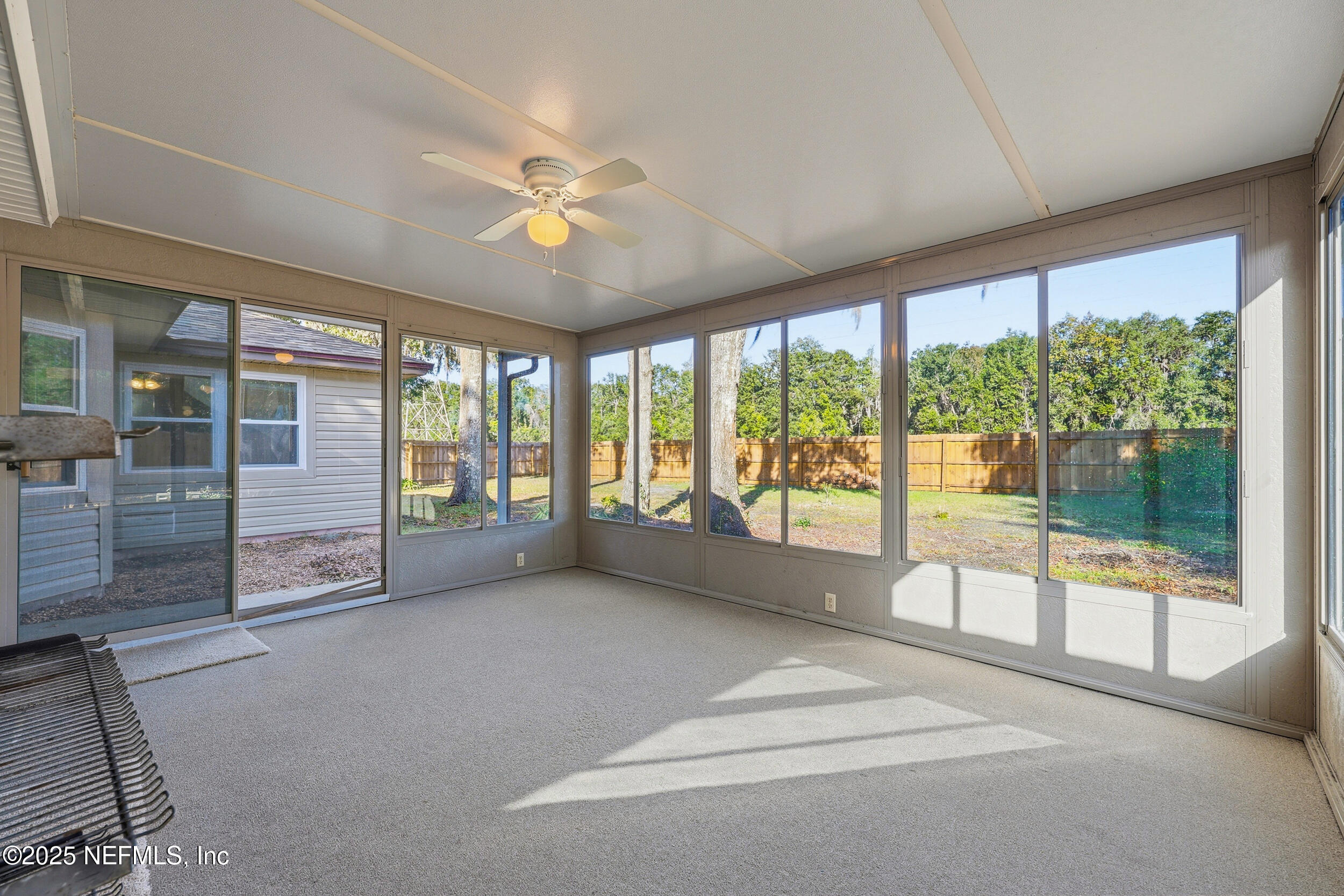 3225 Trophy Place Jacksonville, FL 32225 - Photo 11 of 30 a view of an empty room with windows and city view