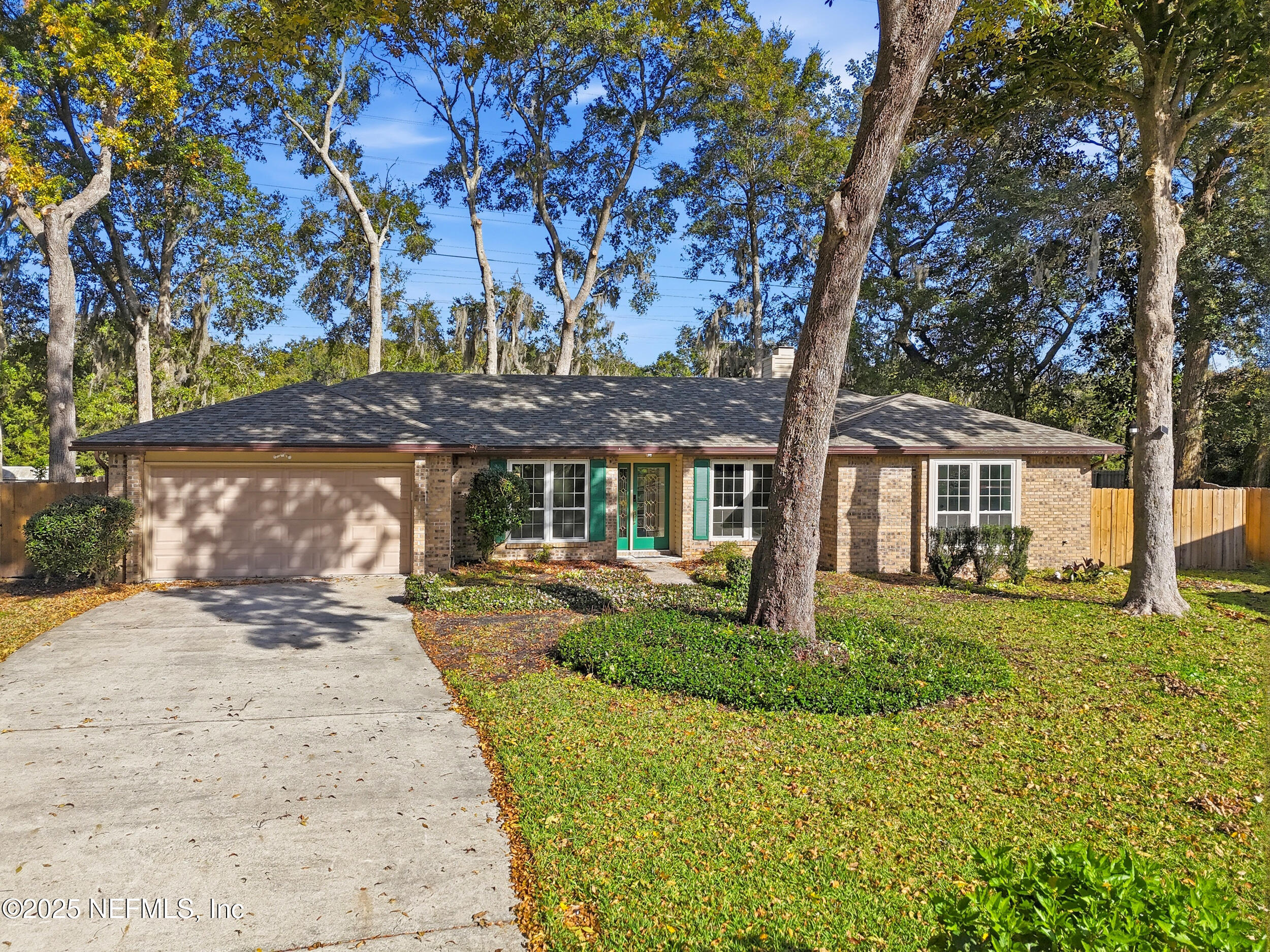 3225 Trophy Place Jacksonville, FL 32225 - Photo 30 of 30 a front view of a house with a yard