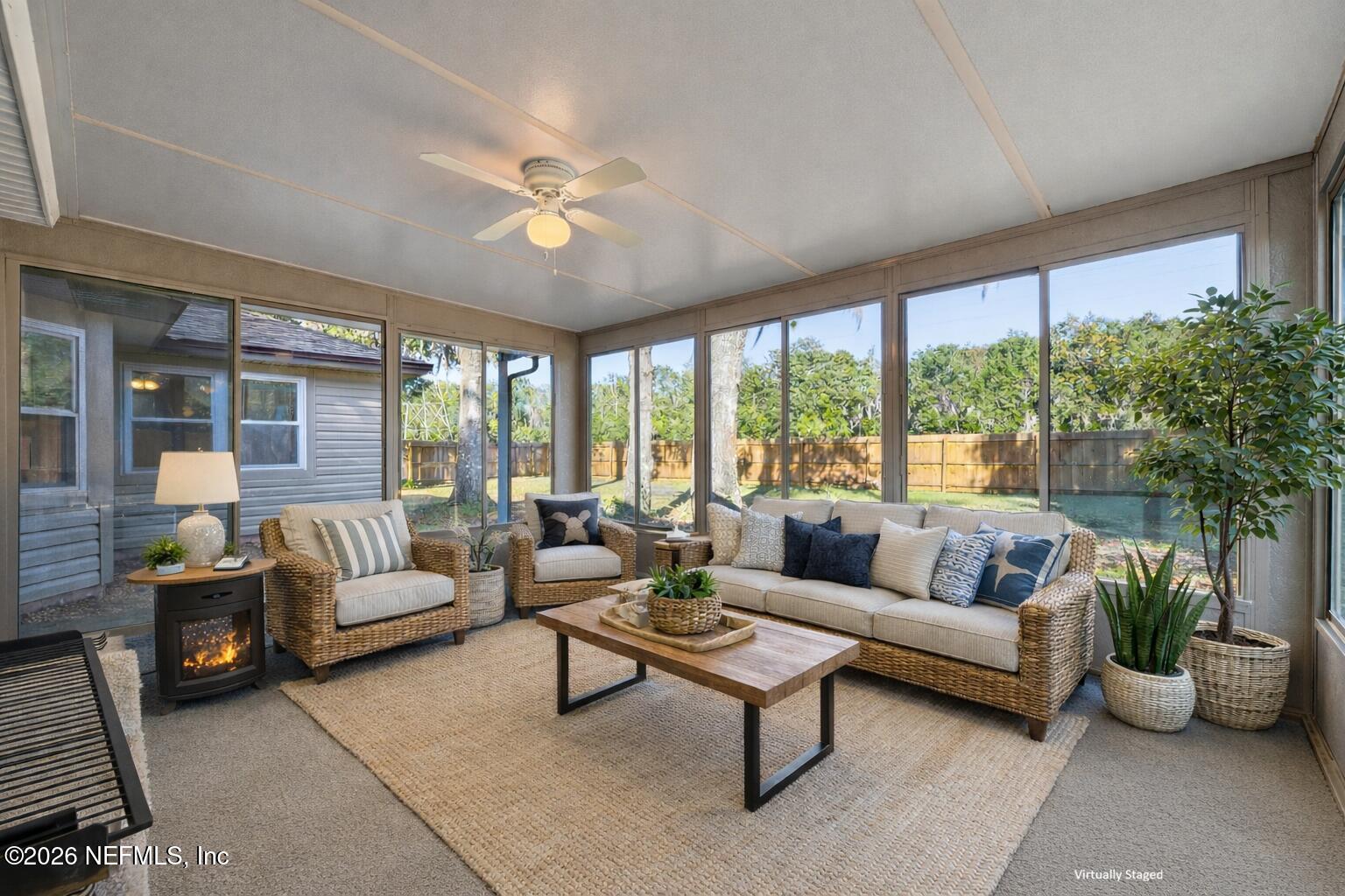 3225 Trophy Place Jacksonville, FL 32225 - Photo 10 of 30 a living room with furniture and a large window