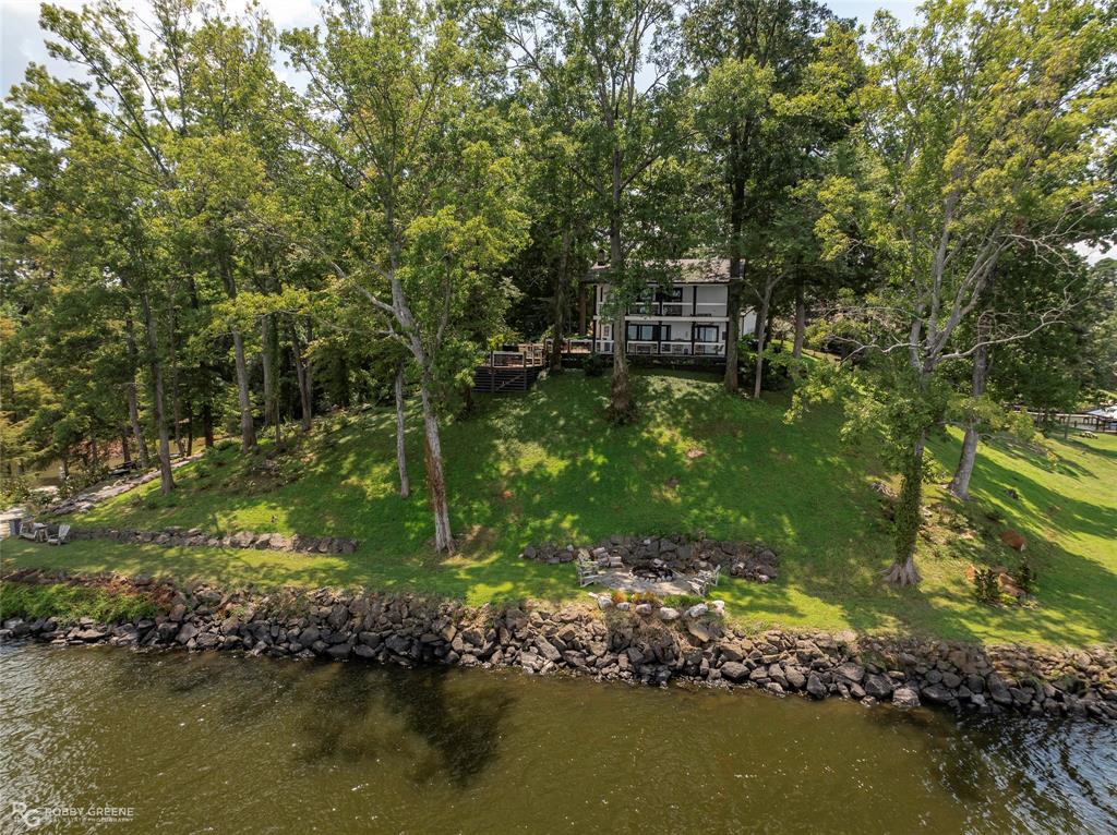 128 Knott Drive Many, LA 71449 - Photo 35 of 39 a view of a lake with a park