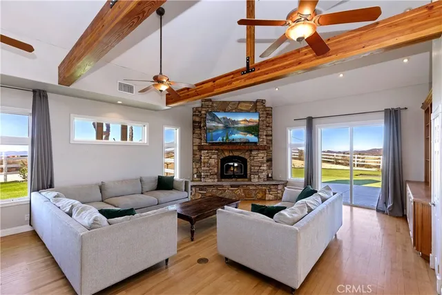 a kitchen with stainless steel appliances granite countertop a stove a refrigerator and a sink