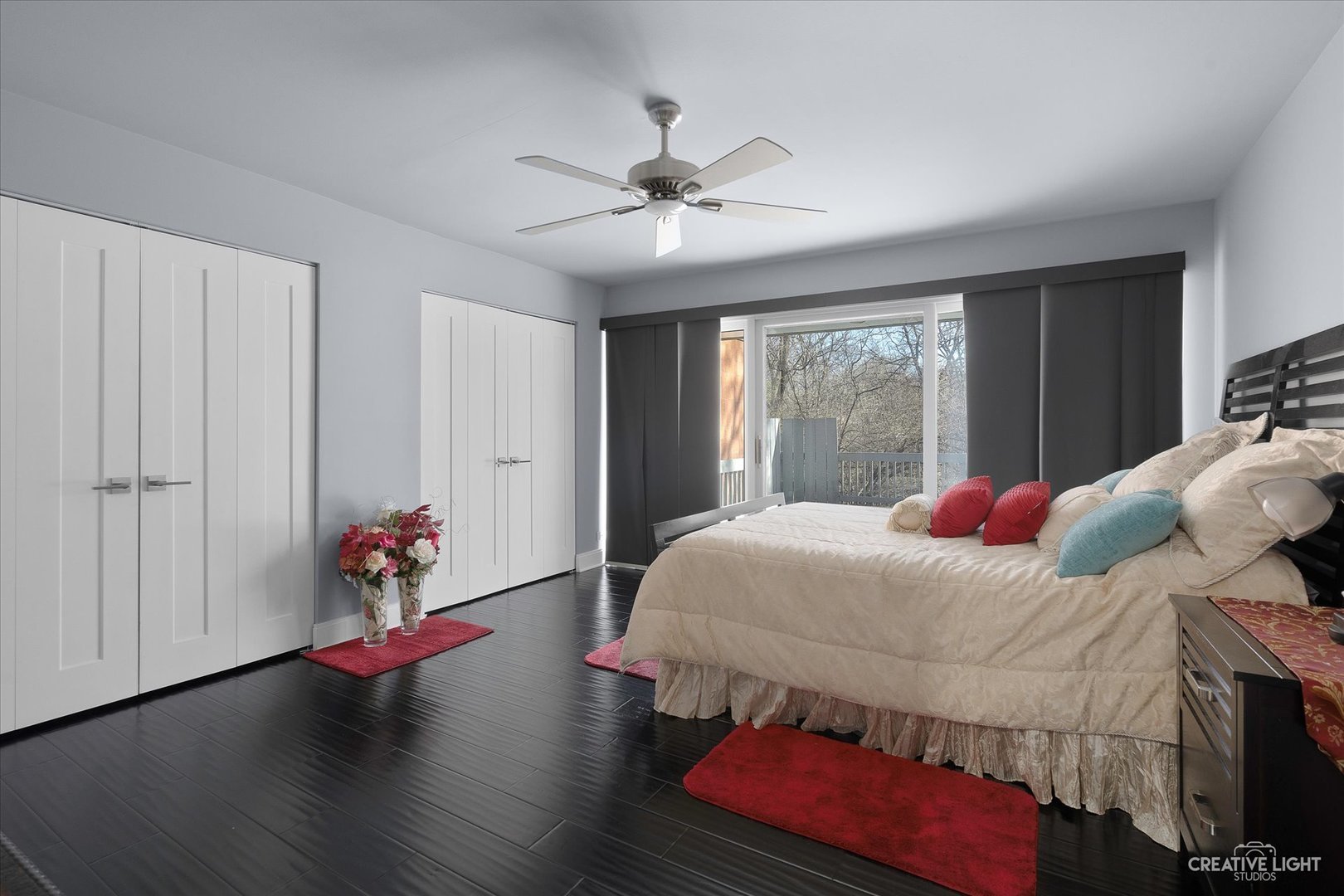 4 Eden Lane Joliet, IL 60431 - Photo 19 of 51 a bedroom with a bed and a chandelier