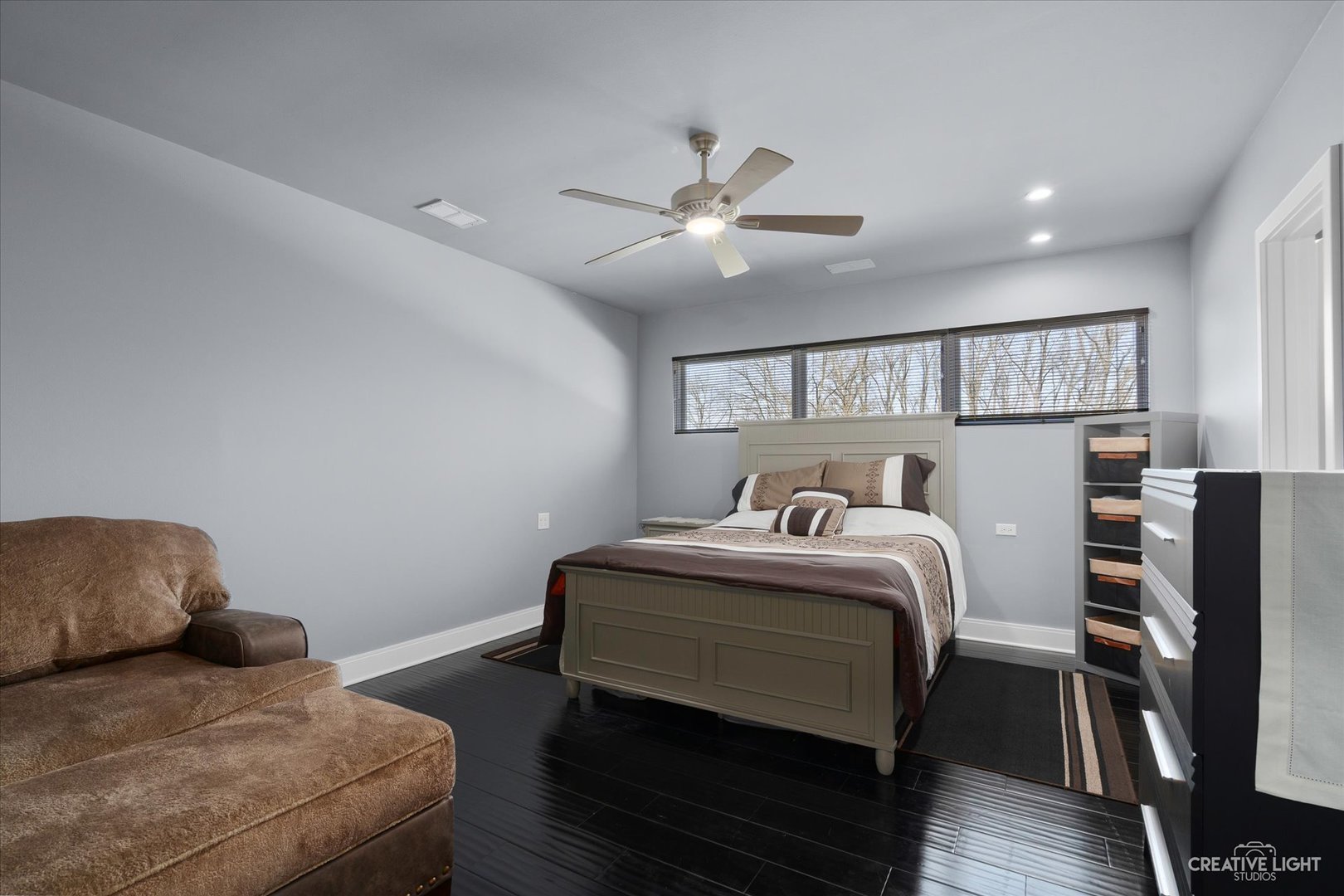 4 Eden Lane Joliet, IL 60431 - Photo 27 of 51 a bedroom with a bed and a ceiling fan