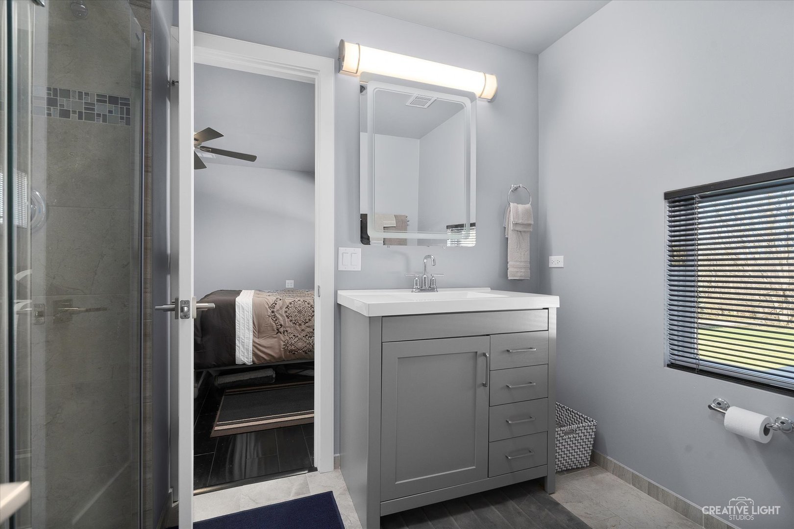 4 Eden Lane Joliet, IL 60431 - Photo 28 of 51 a bathroom with a sink and a mirror