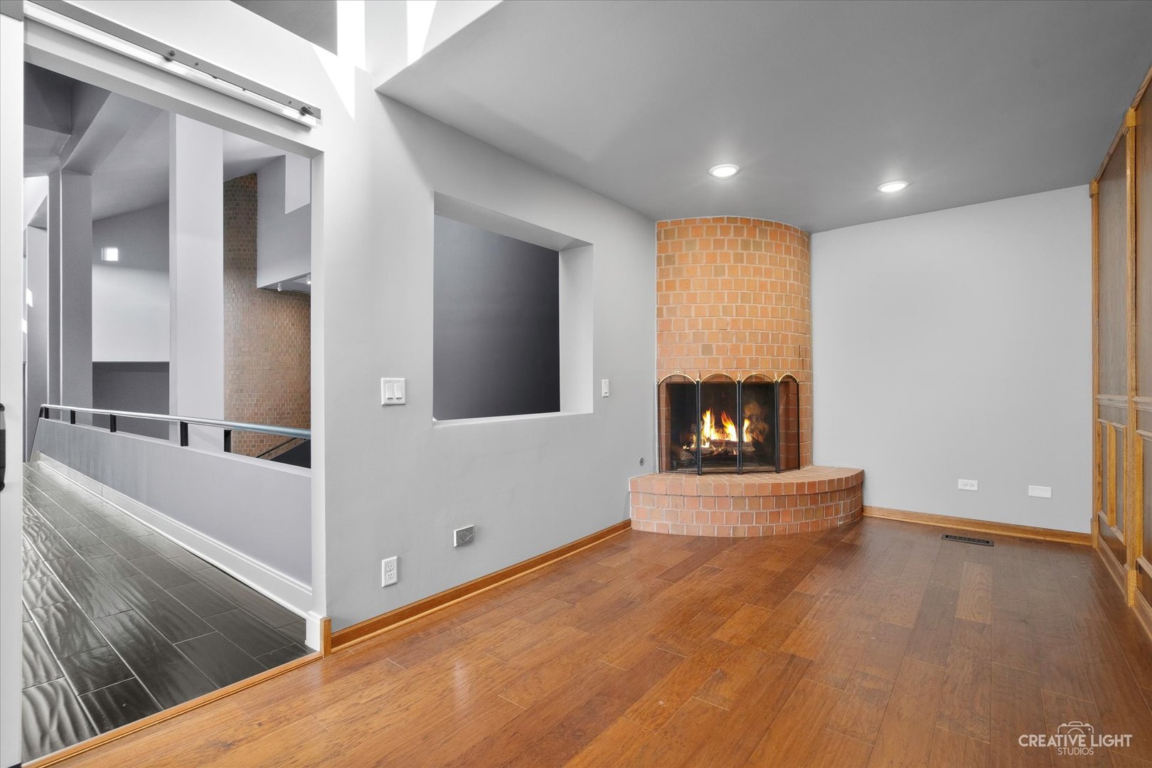4 Eden Lane Joliet, IL 60431 - Photo 30 of 51 a view of an empty room with a fireplace and a window