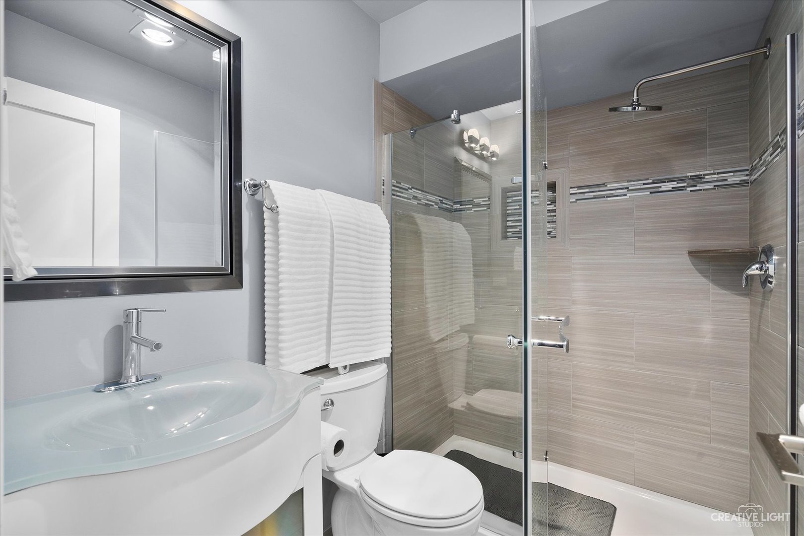 4 Eden Lane Joliet, IL 60431 - Photo 34 of 51 a bathroom with a sink toilet and shower