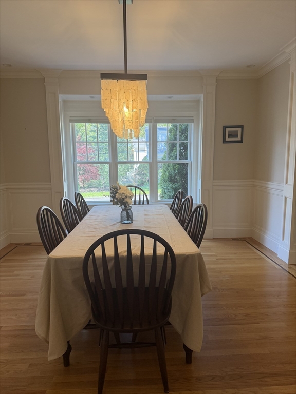 65 Denton Road Wellesley, MA 02482 - Photo 4 of 16 a view of a dining room with furniture window and outside view