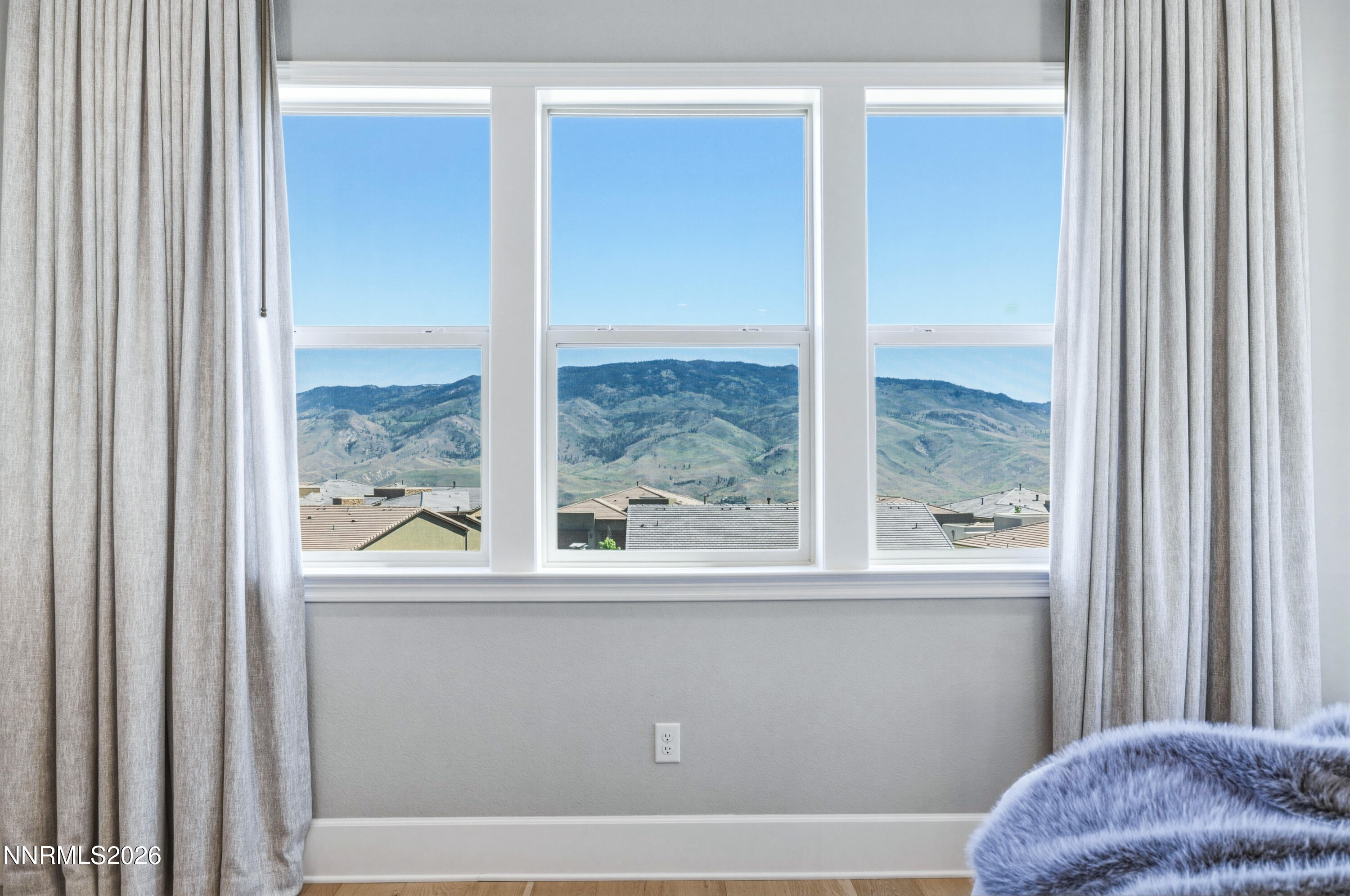 9028 Iron Sky Court Reno, NV 89523 - Photo 11 of 36 a view of a large window with a balcony