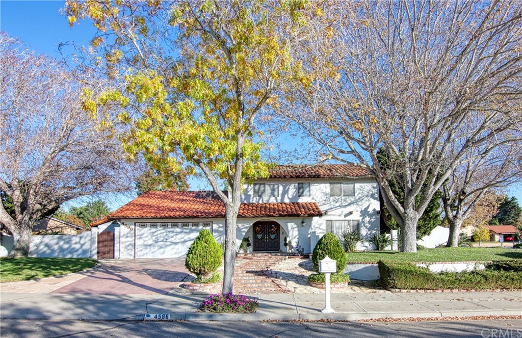 4596 Lamplighter Lane Santa Maria, CA 93455 - Photo 1 of 1 a front view of a house with garden