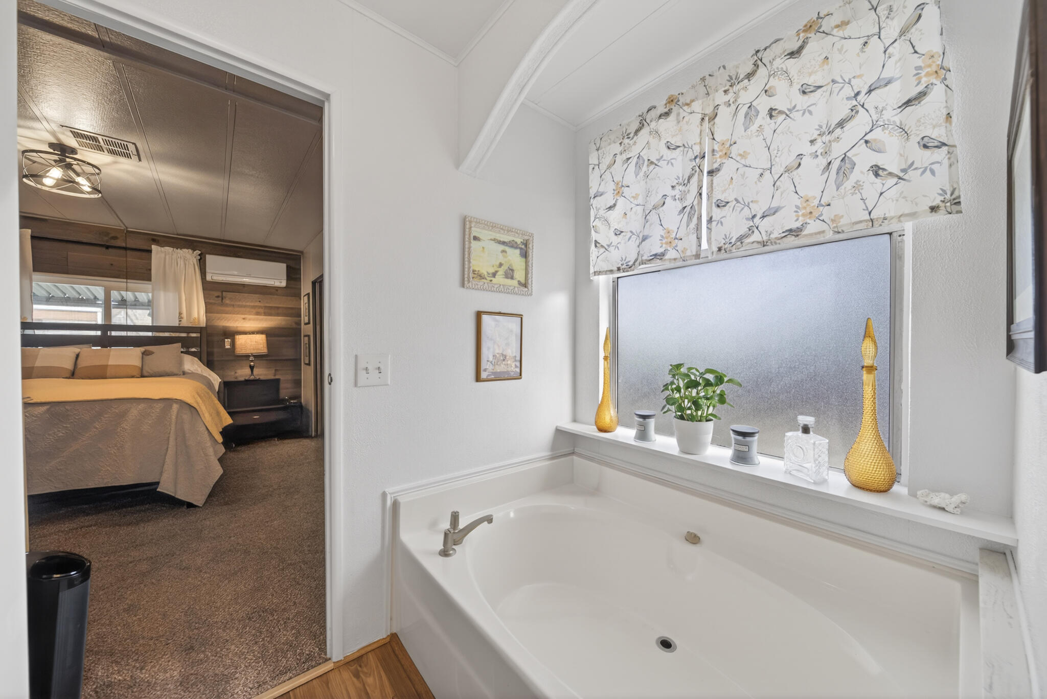 1059 Eagle Nest Road Redding, CA 96003 - Photo 11 of 44 a bathroom with a tub and sink