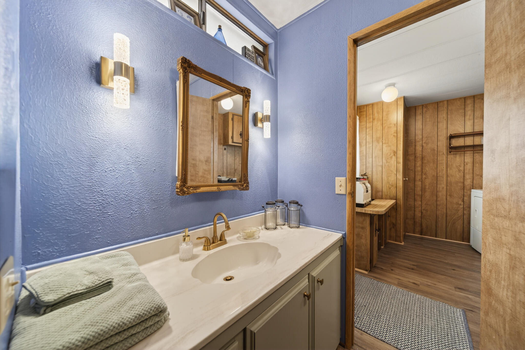 1059 Eagle Nest Road Redding, CA 96003 - Photo 15 of 44 a bathroom with a sink and a mirror
