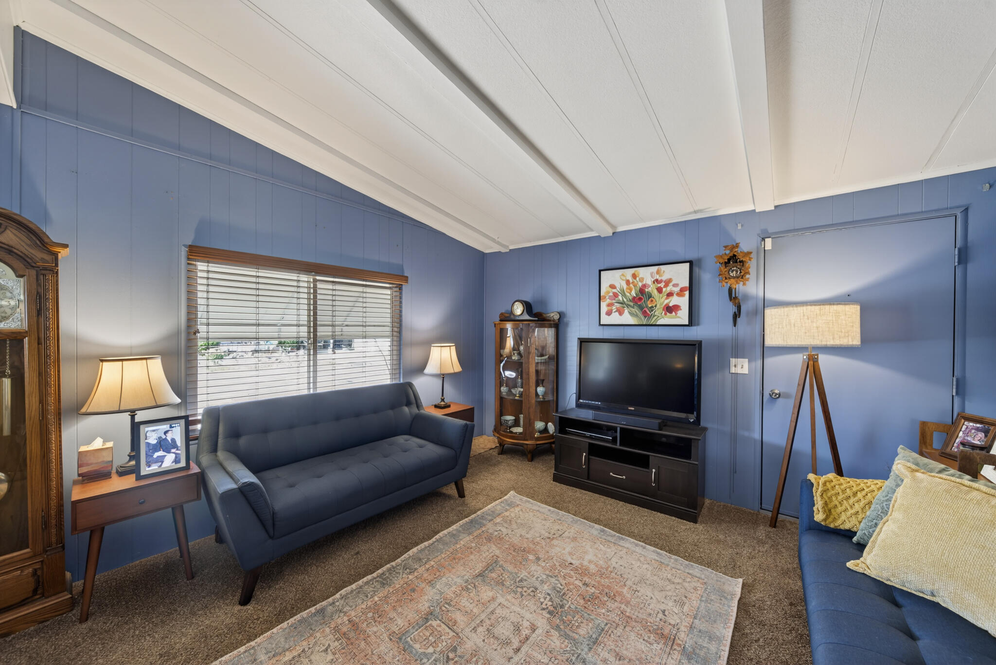 1059 Eagle Nest Road Redding, CA 96003 - Photo 25 of 44 a living room with furniture and a flat screen tv