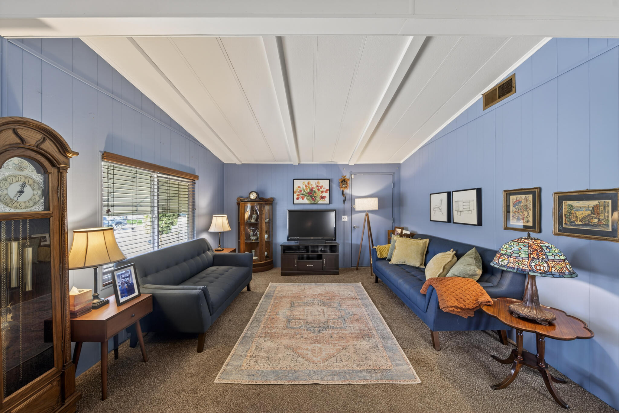 1059 Eagle Nest Road Redding, CA 96003 - Photo 3 of 44 a living room with furniture and a flat screen tv