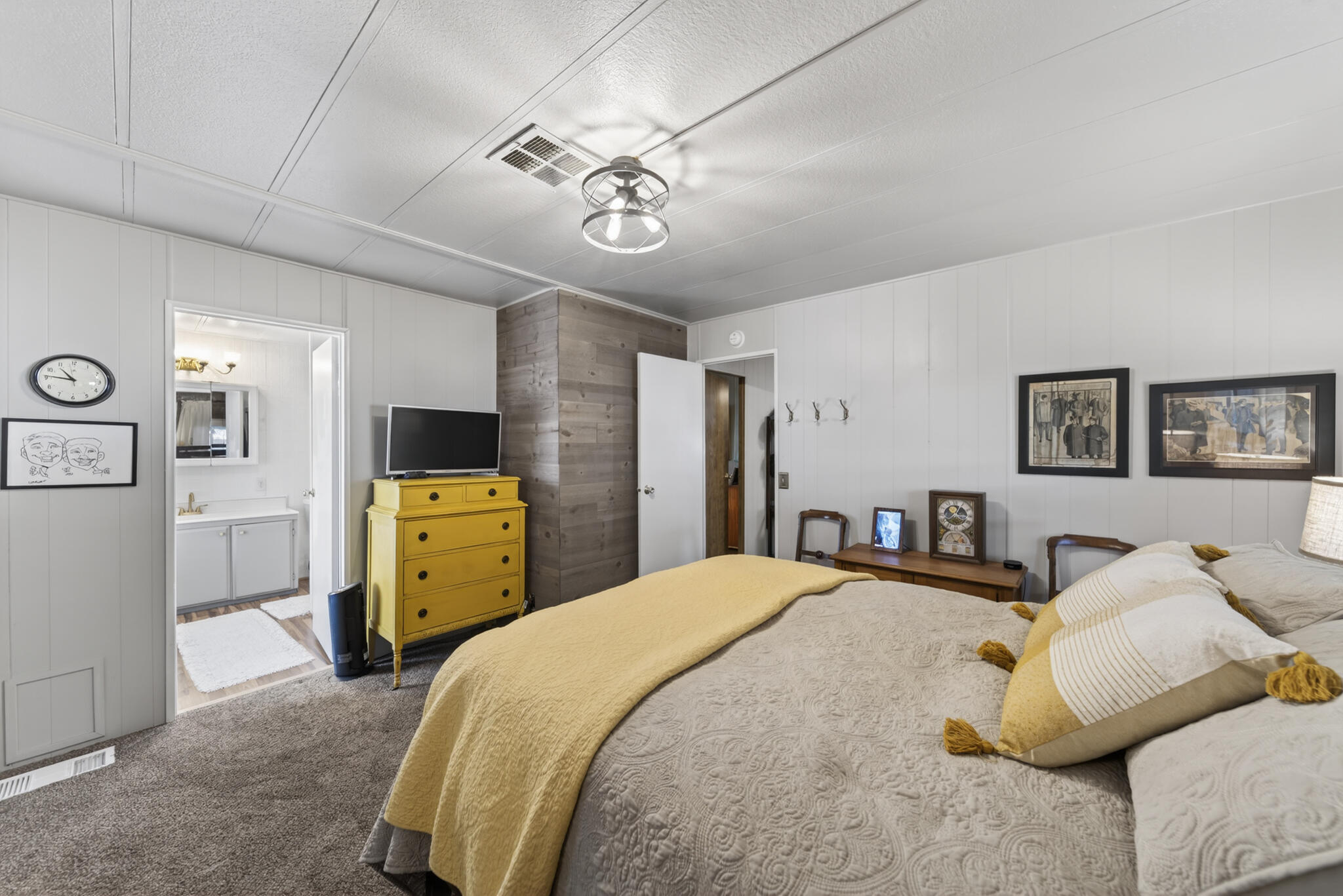 1059 Eagle Nest Road Redding, CA 96003 - Photo 9 of 44 a bedroom with a bed and a tv
