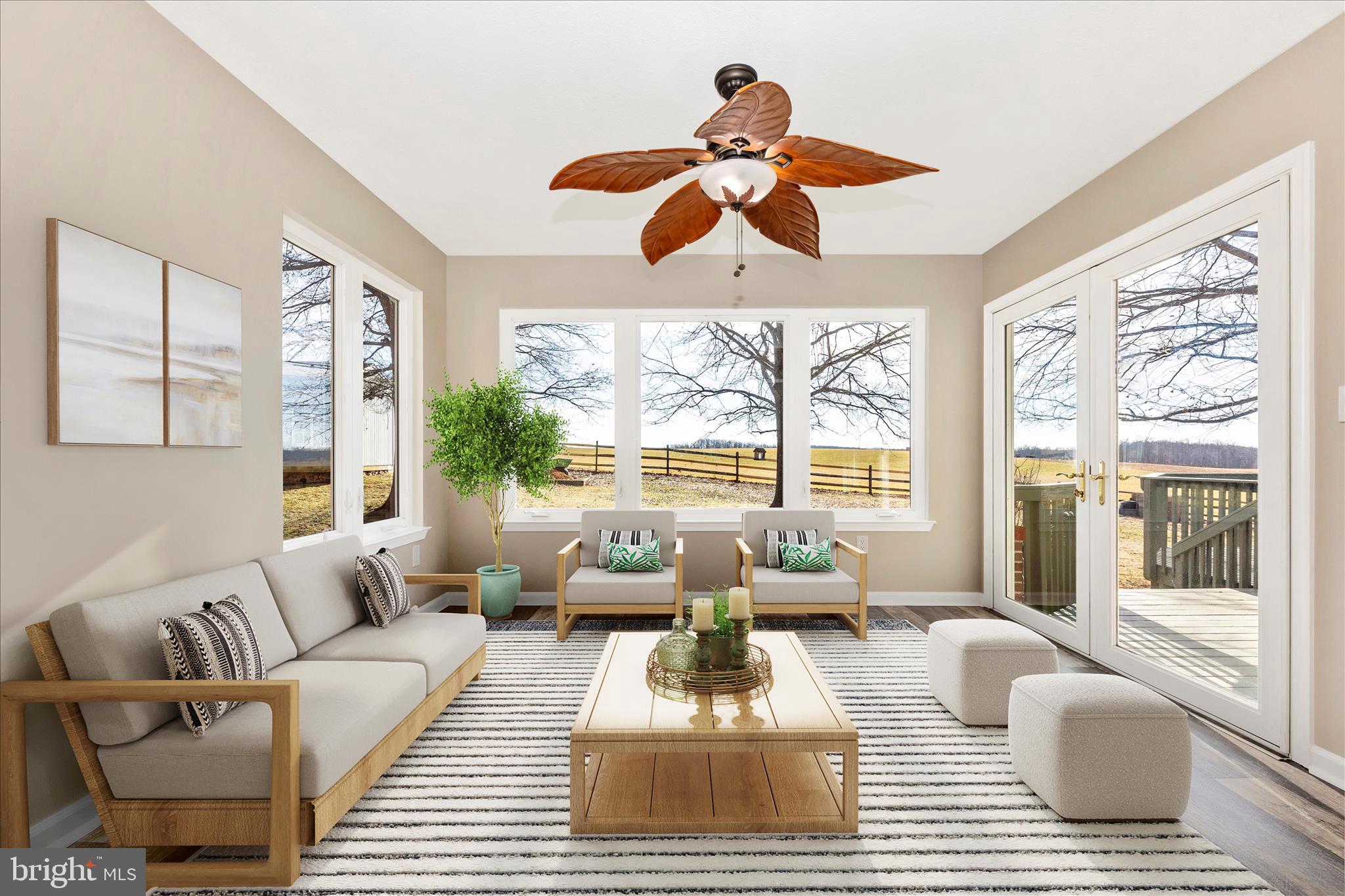 14695 Oak Orchard Road New Windsor, MD 21776 - Photo 15 of 57 a living room with furniture ceiling fan and a large window