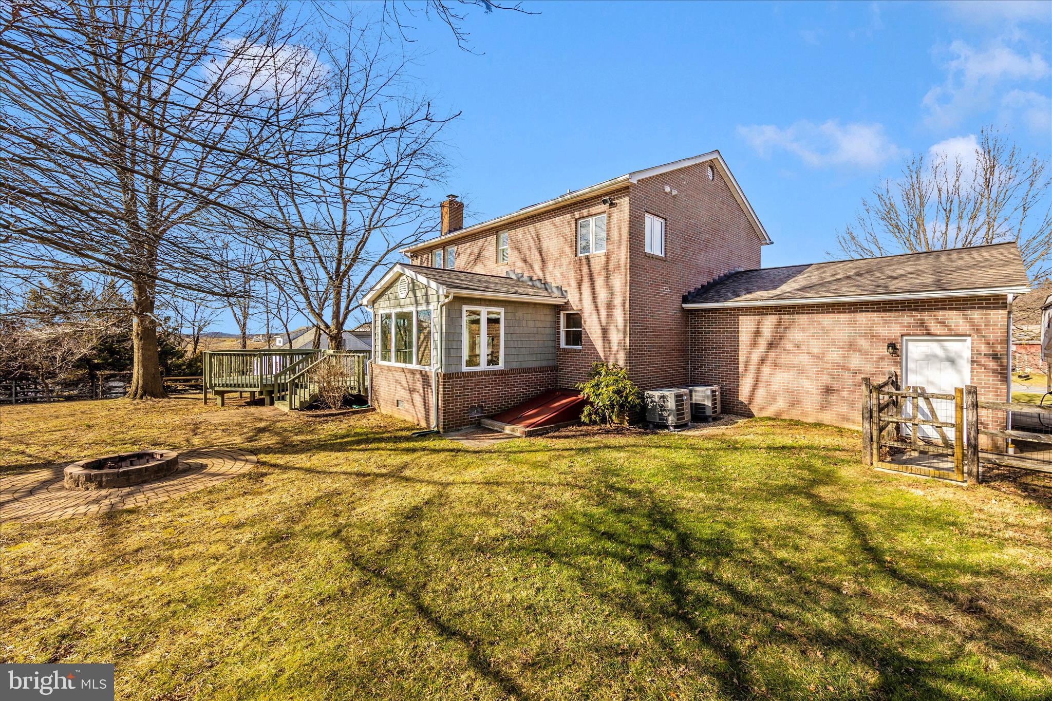 14695 Oak Orchard Road New Windsor, MD 21776 - Photo 53 of 57 a view of a house with backyard and sitting area