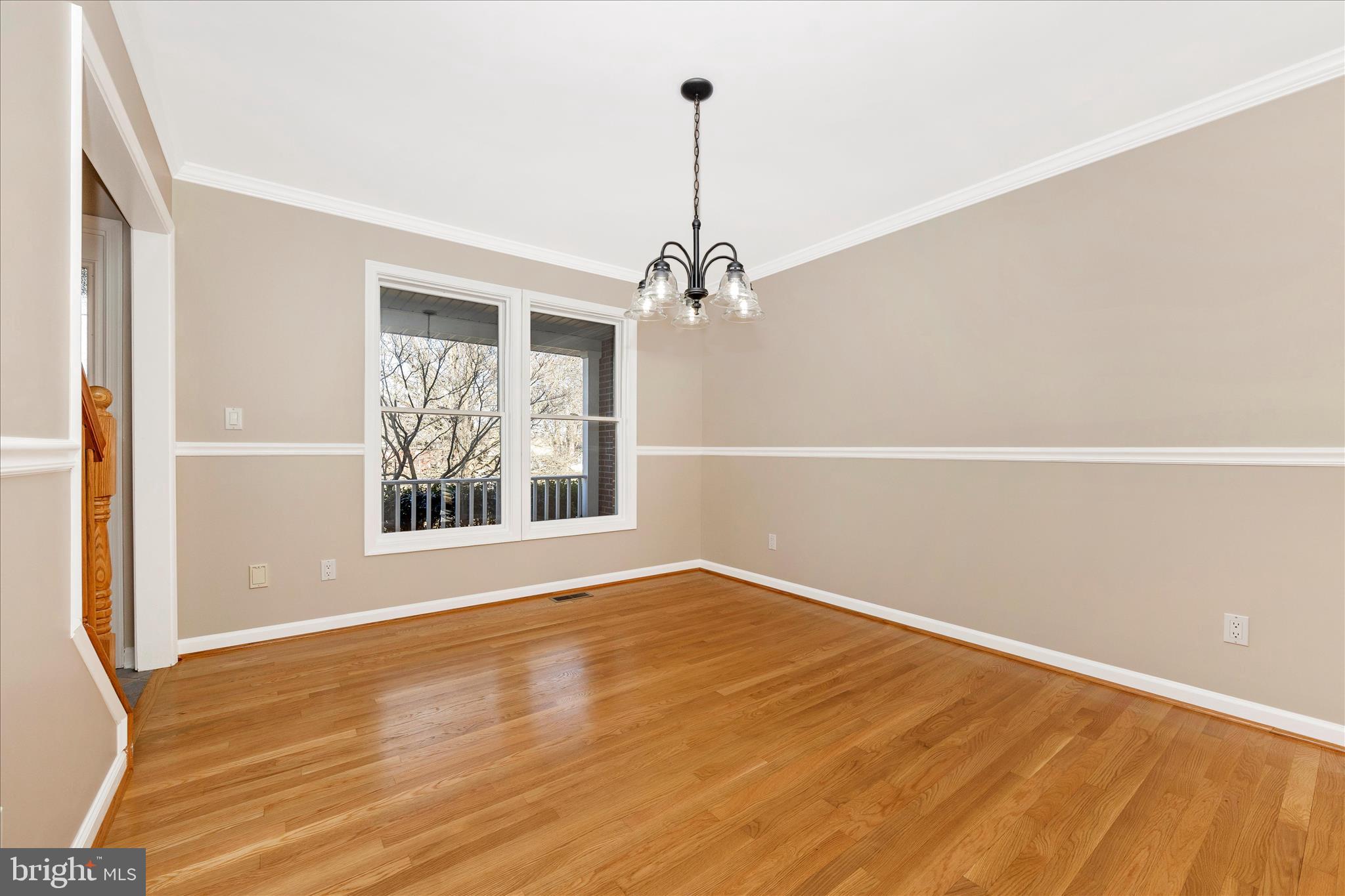 14695 Oak Orchard Road New Windsor, MD 21776 - Photo 7 of 57 a view of a big room with wooden floor and windows