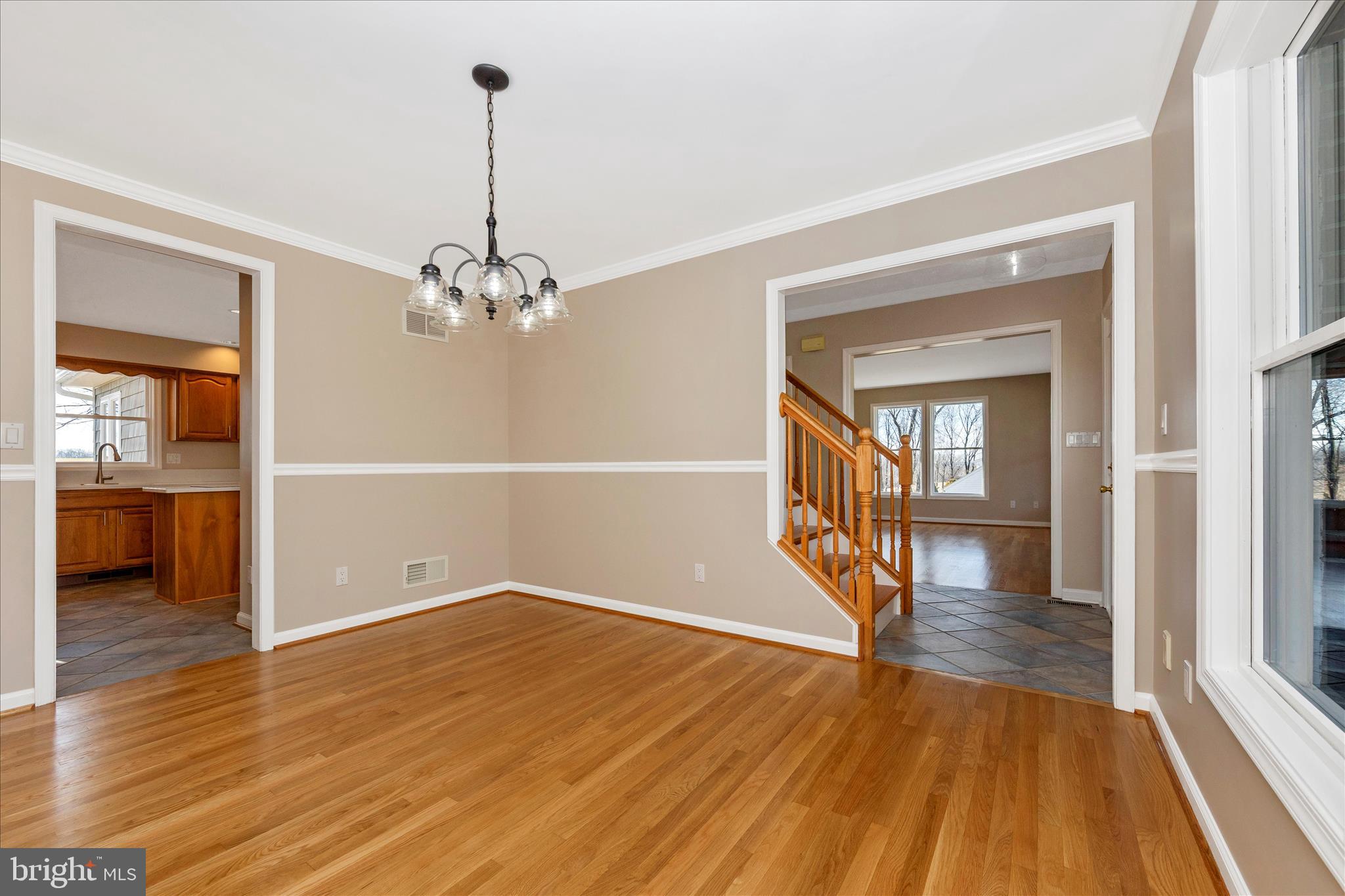 14695 Oak Orchard Road New Windsor, MD 21776 - Photo 9 of 57 wooden floor in an empty room with a window