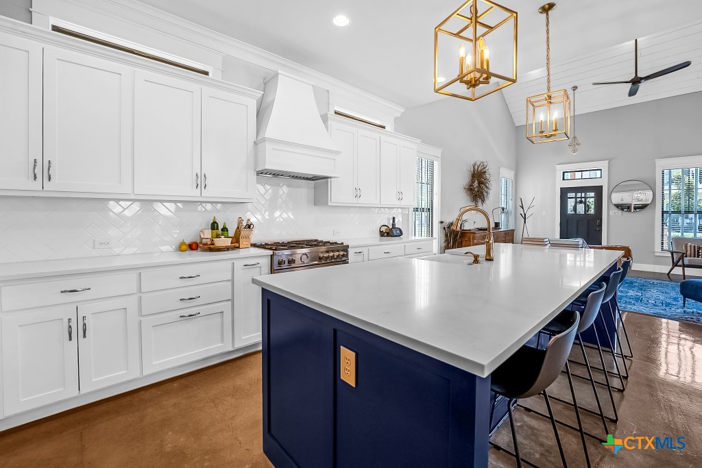 659 Prospect Way New Braunfels, TX 78130 - Photo 15 of 32 a kitchen with cabinets appliances and a counter space