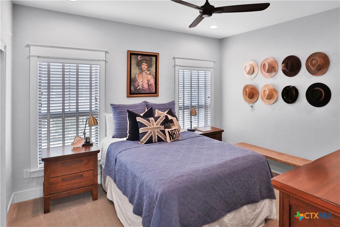 659 Prospect Way New Braunfels, TX 78130 - Photo 24 of 32 a bed room with a bed and a window