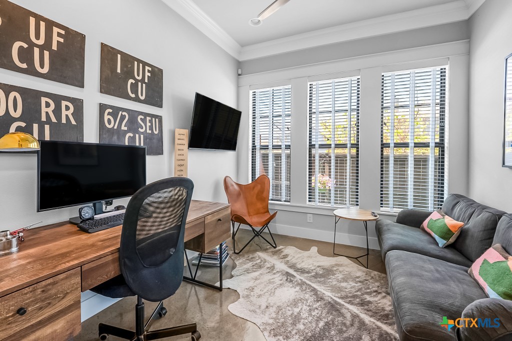 659 Prospect Way New Braunfels, TX 78130 - Photo 27 of 32 a view of a livingroom with workspace and a couch