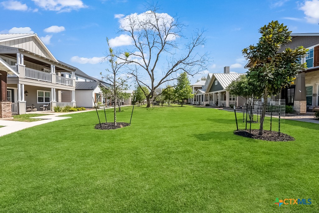 659 Prospect Way New Braunfels, TX 78130 - Photo 29 of 32 a garden with trees in front of it
