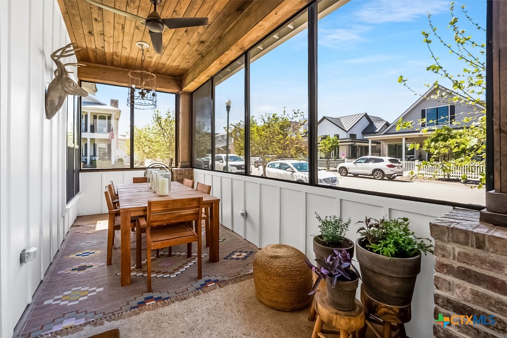 659 Prospect Way New Braunfels, TX 78130 - Photo 7 of 32 a view of a chairs and table in a patio
