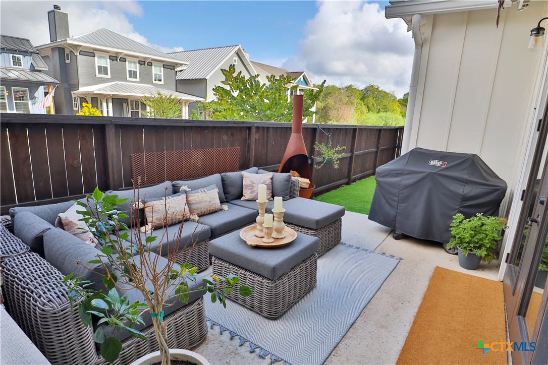 659 Prospect Way New Braunfels, TX 78130 - Photo 9 of 32 a view of a chairs and table in the patio