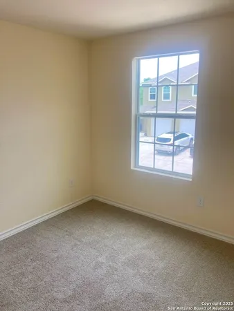 an empty room with a window
