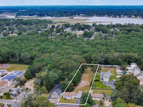 an aerial view of a house with a garden