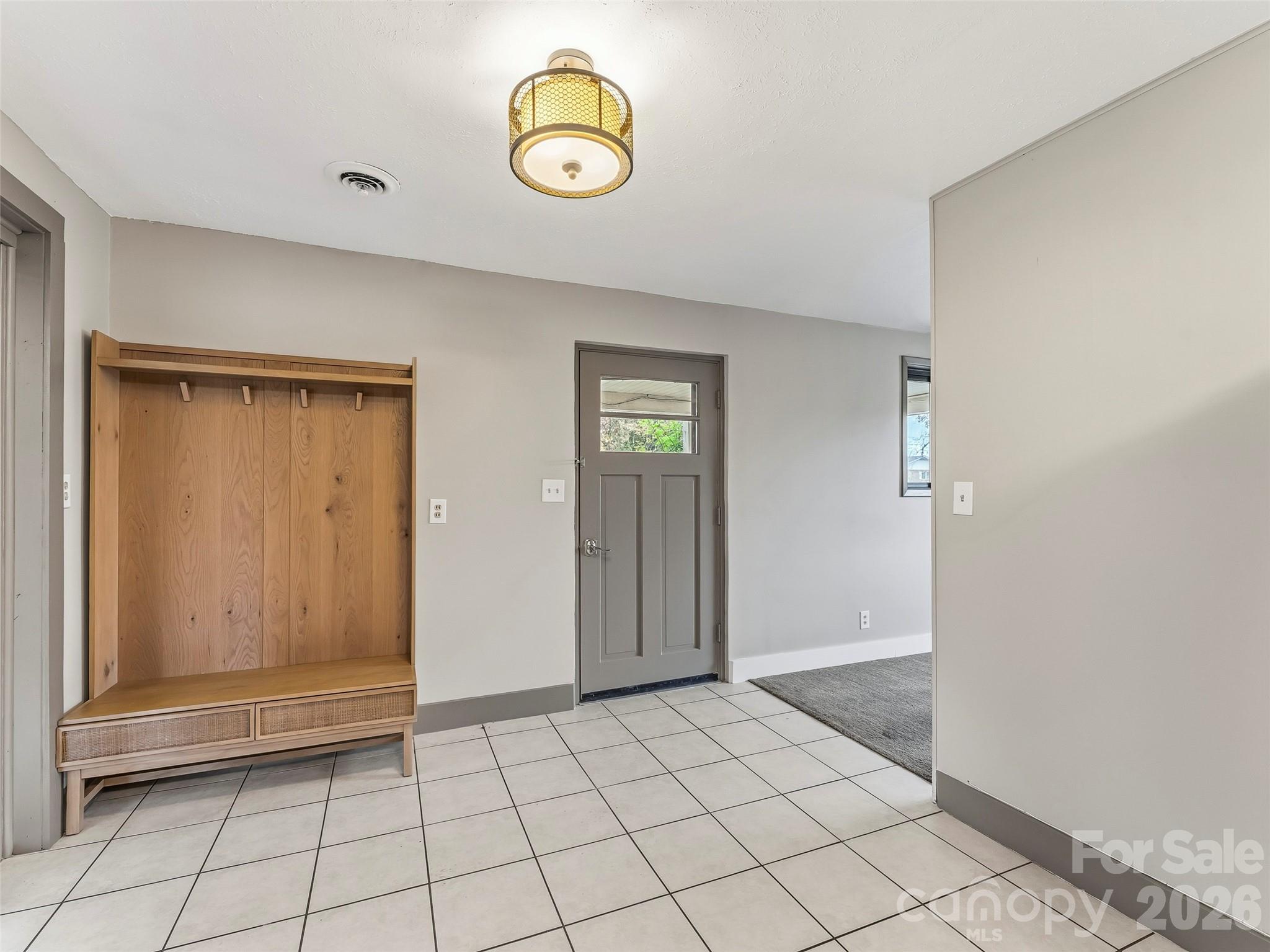 605 Dana Road Hendersonville, NC 28792 - Photo 18 of 38 a view of an empty room and window